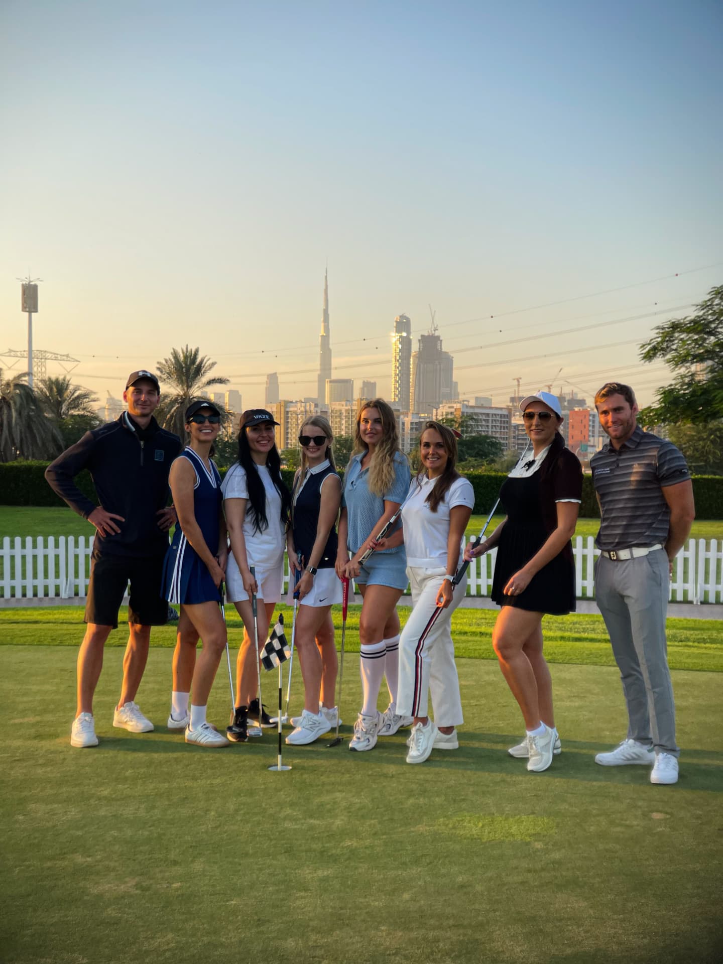 Golf sunset session with the Burj Khalifa skyline behind